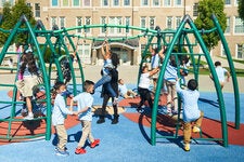 Students at Dr. Michael D. Fox elementary school wear light blue and khaki uniforms. The community school in Hartford, Conn., works with 10 to 20 organizations to help students and families.