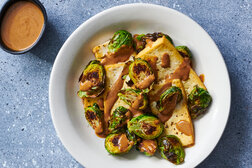 Image for Sheet-Pan Tofu and Brussels Sprouts With Hoisin-Tahini Sauce