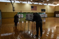 Voters cast ballots in Lansing, Mich., in 2020.