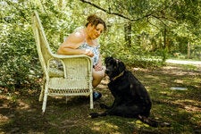 Heather Massey of Carlton, Ga., with her dog, Lunabear. She is still paying off a bill for scans and care six years after her previous dog, Ladybird, was diagnosed with brain cancer.