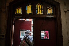 A migrant center inside the Metro Baptist Church in Midtown Manhattan has become a home for migrants who cook and help each other start over in New York City. 