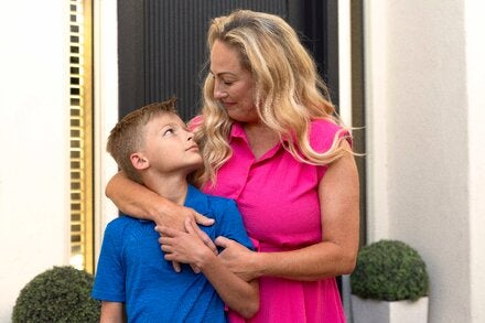 Renee Johnson with her son. She was charged for storage of a contaminated sample for two years even after the company, ViaCord, told her all had gone well.