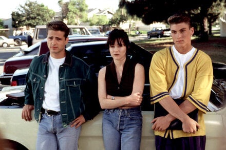 Doherty with Jason Priestley, left, and Brian Austin Green in “Beverly Hills 90210” in 1993. The series, full of catfights and relationship spats, was an instant cult hit.