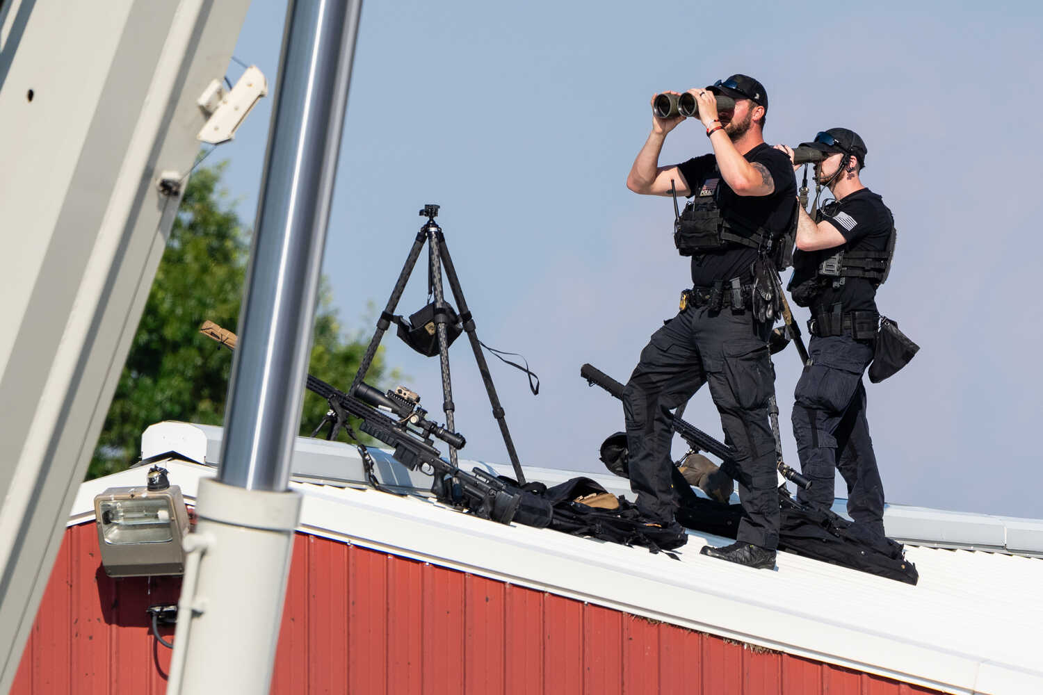 A Secret Service sniper team on watch before former President Donald J. Trump spoke at a rally in Butler, Pa., on Saturday.