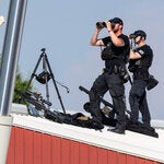 A Secret Service sniper team on watch before former President Donald J. Trump spoke at a rally in Butler, Pa., on Saturday.