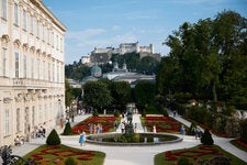 The Pegasus fountain in the Mirabell Gardens, with Salzburg’s medieval fortress looming in the distance.