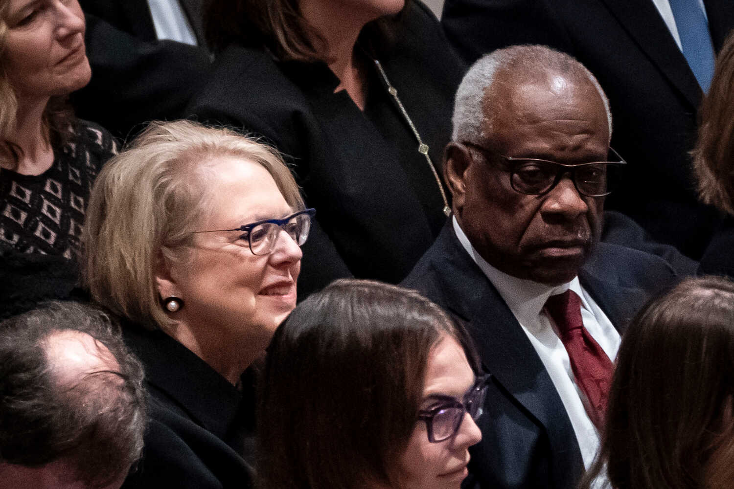 Customs and Border Protection records revealed that Justice Clarence Thomas and his wife, Virginia Thomas, left, took a round trip between Hawaii and New Zealand in November 2010 on Harlan Crow’s private jet, according to the letter. 