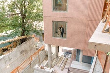 Jing Liu and Florian Idenburg, the principal architects at SO-IL, in an unfinished residence at 144 Vanderbilt.