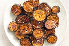 An oil-glossed roasting at high heat, as in this recipe, leaves the surface of the slices golden and tambourine taut. 