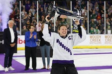 Kendall Coyne Schofield hoisting the Walter Cup trophy after winning the first-ever Professional Women’s Hockey League finals. An accomplished hockey player, Coyne Schofield was a leading force in the formation of the new women’s league. 