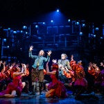 Mark Uhre, center left, as Nick Bottom, and Dan Chameroy, center right, as Nostradamus with members of the “Something Rotten” cast.