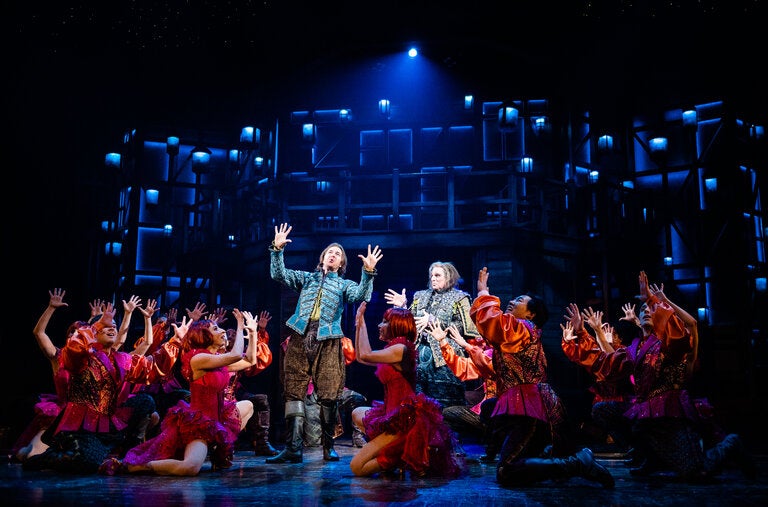 Mark Uhre, center left, as Nick Bottom, and Dan Chameroy, center right, as Nostradamus with members of the “Something Rotten” cast.