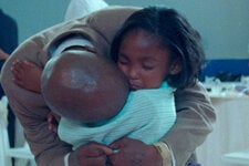 A scene from “Daughters,” a documentary about a program that gives men in prison an opportunity to attend a dance with their daughters.