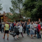 Russians displaced from the border regions waited for aid on Tuesday in Kursk.