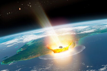 An artist’s impression of a large asteroid impacting Earth at the Chicxulub site in Mexico that caused the end-Cretaceous mass extinction 66 million years ago.