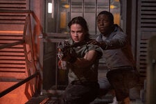 Rain (Cailee Spaeny), left, and Andy (David Jonsson) in “Alien: Romulus,” which tells a familiar story of perseverance, quick thinking and a fight for survival.