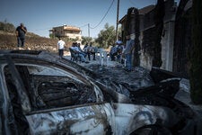 The aftermath of an attack on the village of Jit in the Israeli-occupied West Bank.