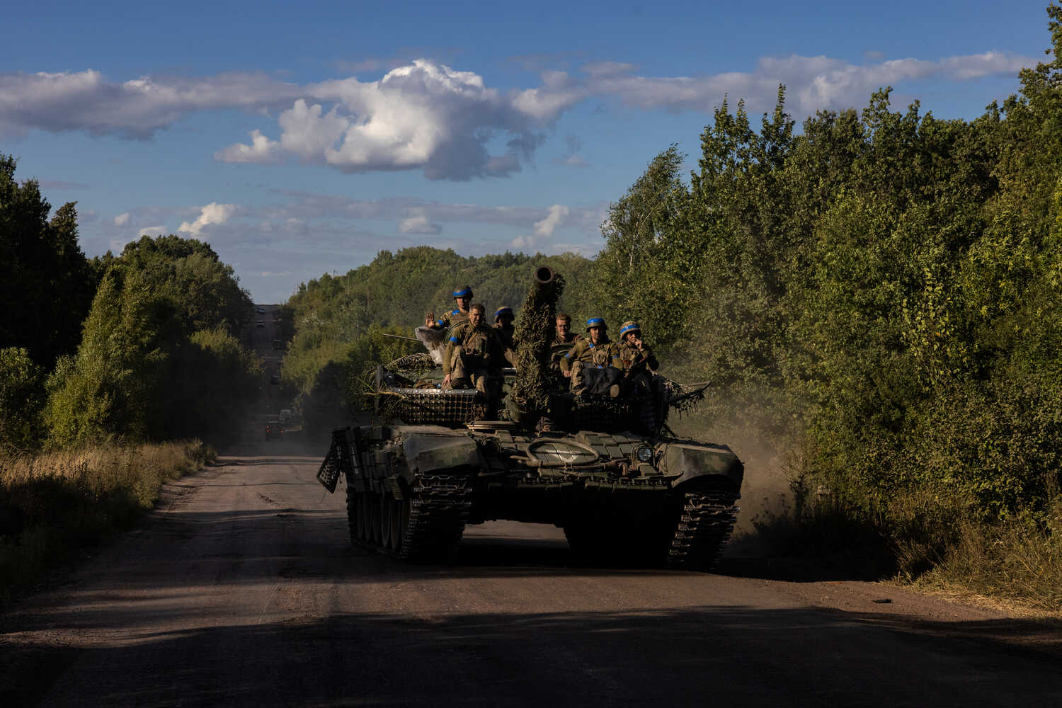 Ukrainian troops driving a tank along a main road in the Sumy region of Ukraine, near the Russian border, on Monday.