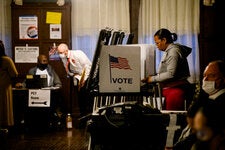 A voter fills out a ballot in Detroit during the midterm elections in 2022. Democrats are planning to monitor polling locations in swing states.