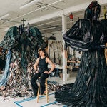 Tau Lewis in her Brooklyn studio, among the giant figures — each about 12 feet tall — that will be part of her first museum show, in Boston.