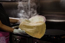 The tangy, spongy bread injera is essential to an Ethiopian meal.