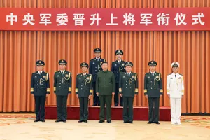 A portrait of Xi Jinping standing in a row with military officials in dress uniform.