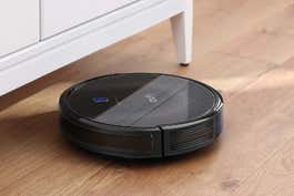 Eufy RoboVac 11S Max on hardwood floor.